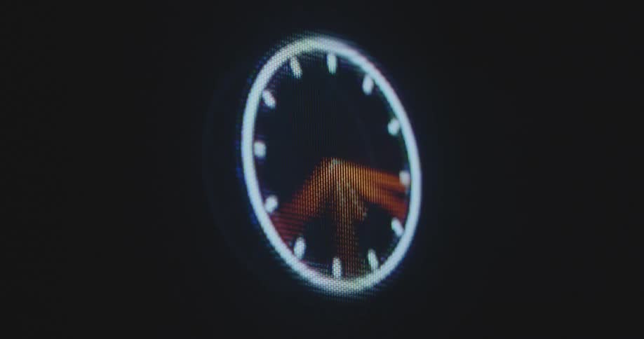 Watch with many clock hands and clockwork mechanism spins extremely fast on the pixelated display of an old computer as time flies and the deadline approaches causing panic and anxieties leading to tension and a trauma