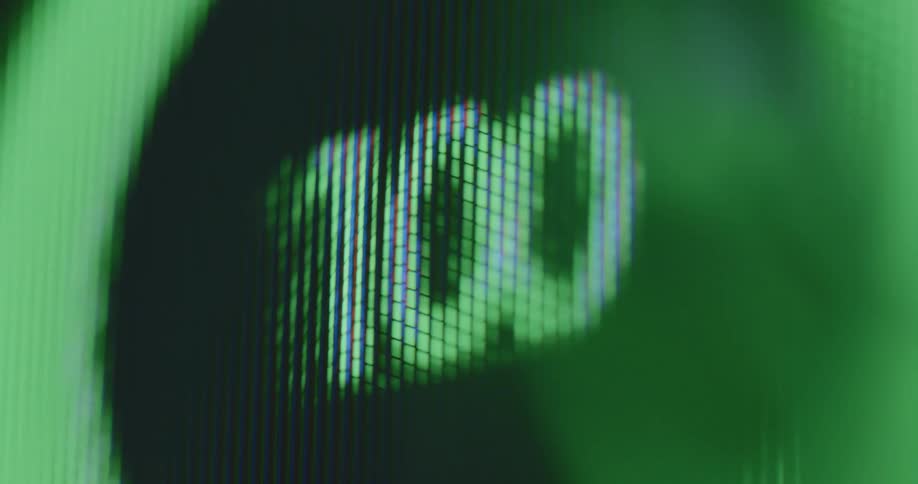 The digital counter meter or gauge goes up to the number one hundred as it turns green and sinks down to zero while changing to red digits as a symbol for reaching a goal or loosing energy on vintage TV screen