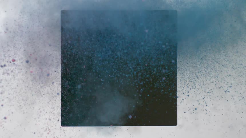 Pink and blue dirt crash together from a black square