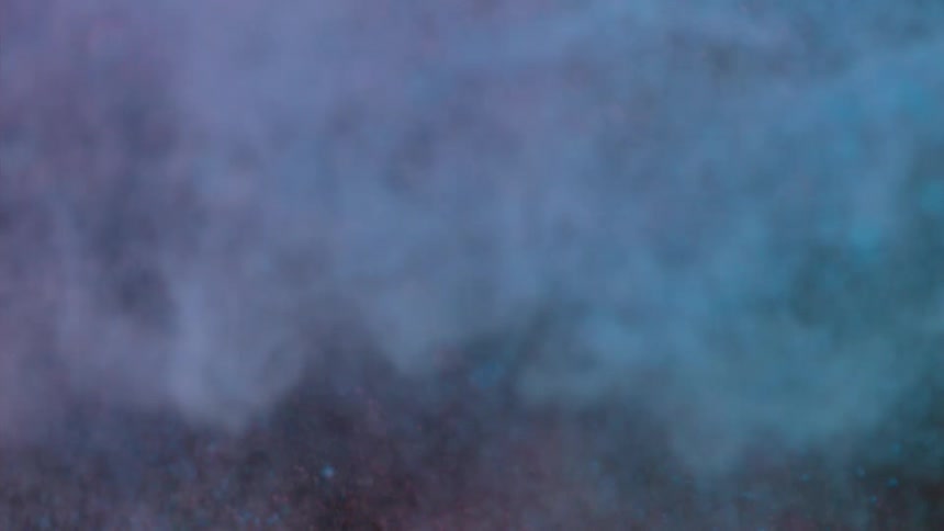 Blue and pink dirt are thrown together