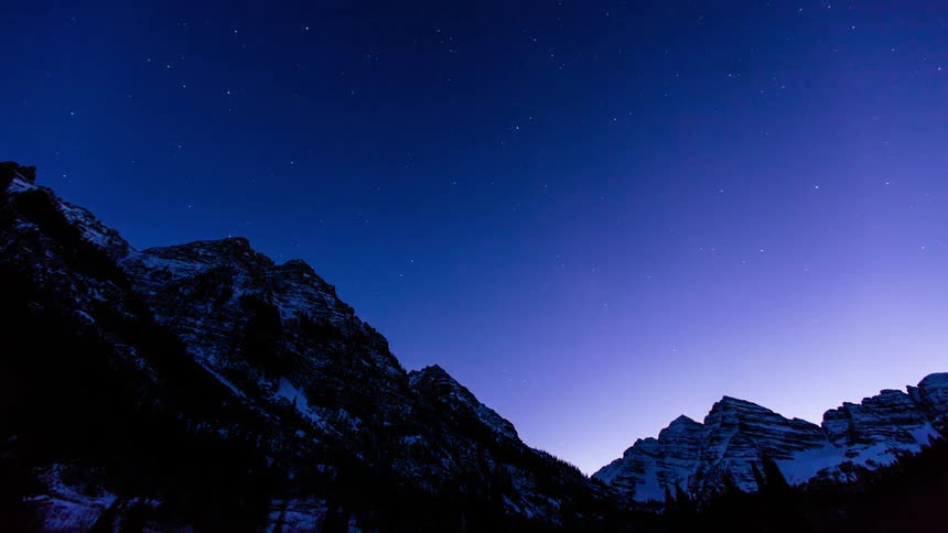 A mountain is covered with snow