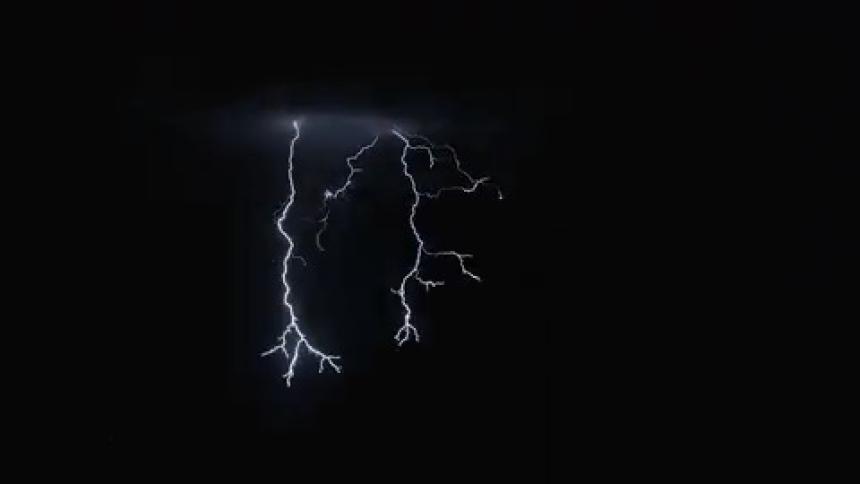 White lightning storm cutting through the dark sky