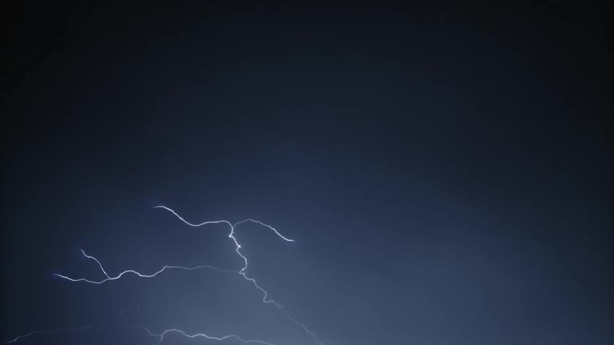Lightning illuminating the night sky
