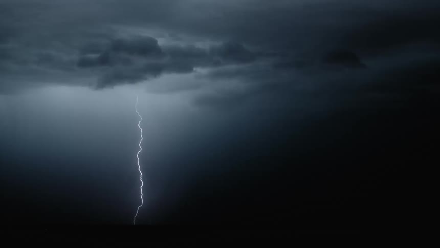 A lightning storm falling from the sky forming beams of light