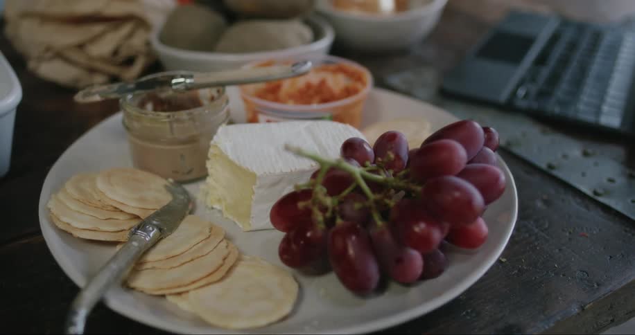 Plate of healthy food with grapes and cheese