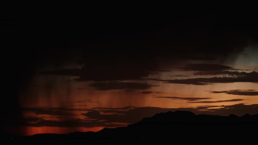 Storm with gusts of thunder over mountains