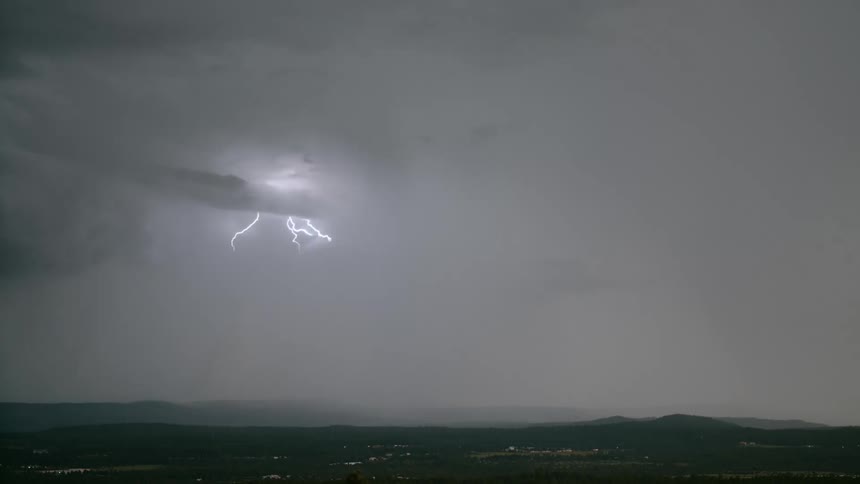 Lightning strikes in a stormy sky