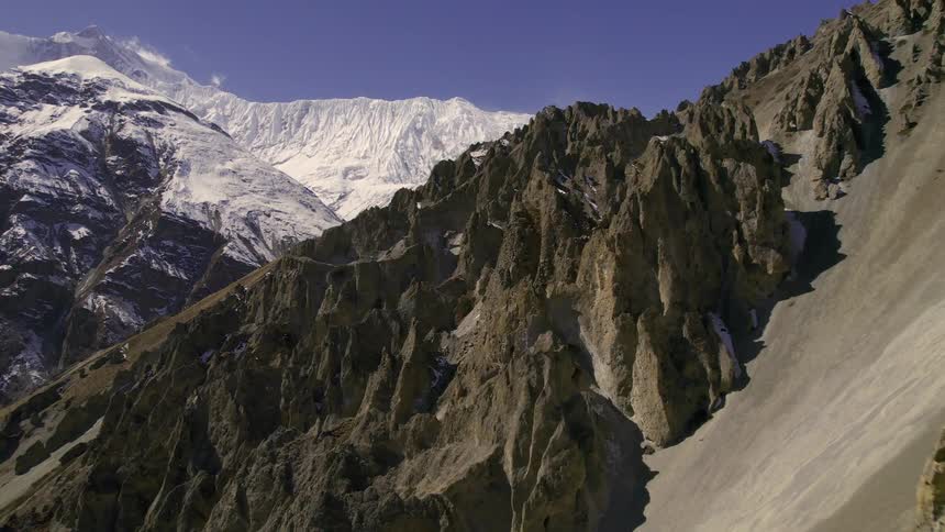 Close up view of mountains with snow in some parts