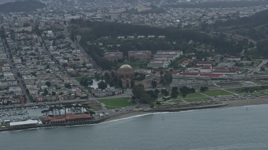 Aerial footage of the iconic Palace of Fine Arts located in San Francisco Bay California captured during a cloudy day
