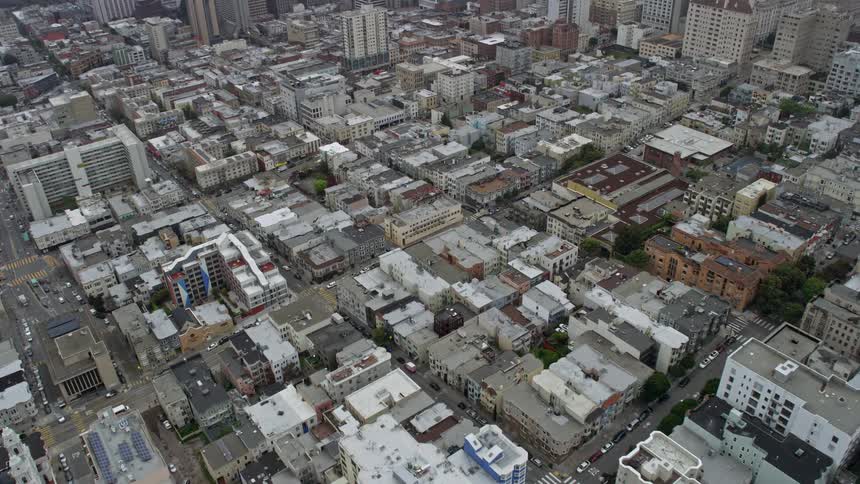  aerial footage of San Francisco's Nob Hill district on a foggy day capturing the city's apartment buildings and residential areas from a stunning POV perspective