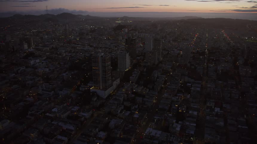 Aerial of metropolitan city during sunset