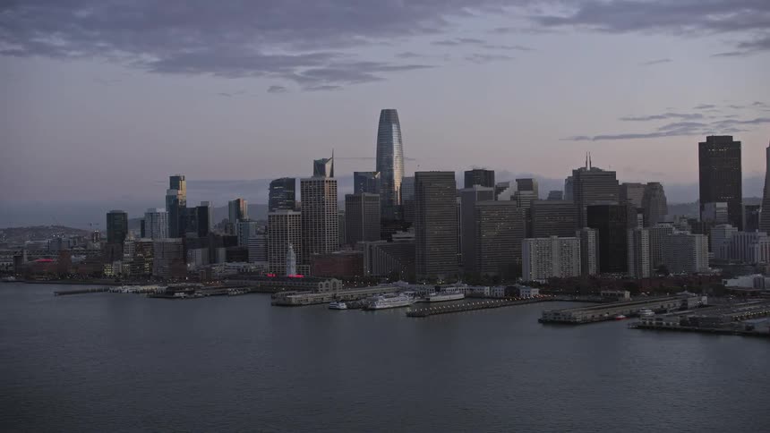  aerial footage capturing the enchanting twilight views of Downtown San Francisco skyline showcasing the high-rise towers and cityscape of Northern California's iconic city