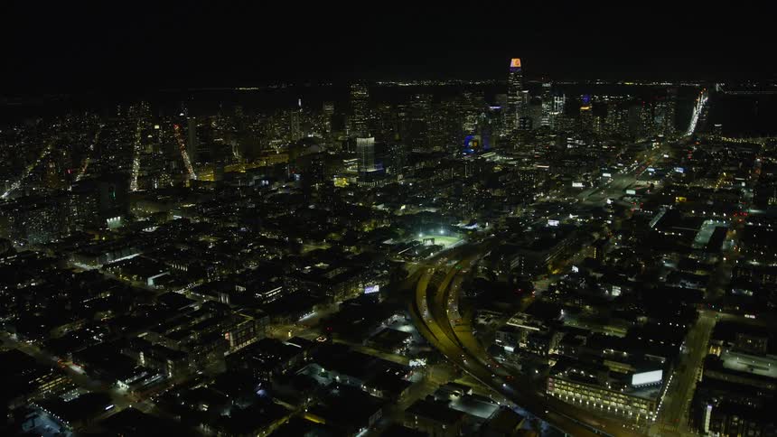 an aerial view of the stunning San Francisco skyline at night showcasing towering skyscrapers and the vibrant downtown area of Northern California