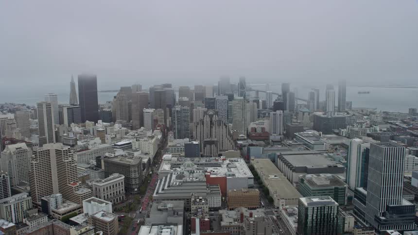 Aerial view of downtown San Francisco skyscrapers on a foggy day in California