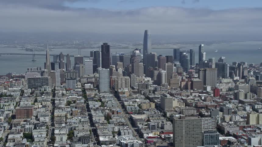  aerial footage showcasing the impressive downtown San Francisco skyline as seen from Pacific Heights California on a partly cloudy day