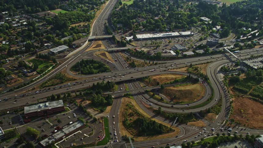 Aerial view of traffic congestion on a cloverleaf ramp at a freeway interchange in Southwest Portland Oregon