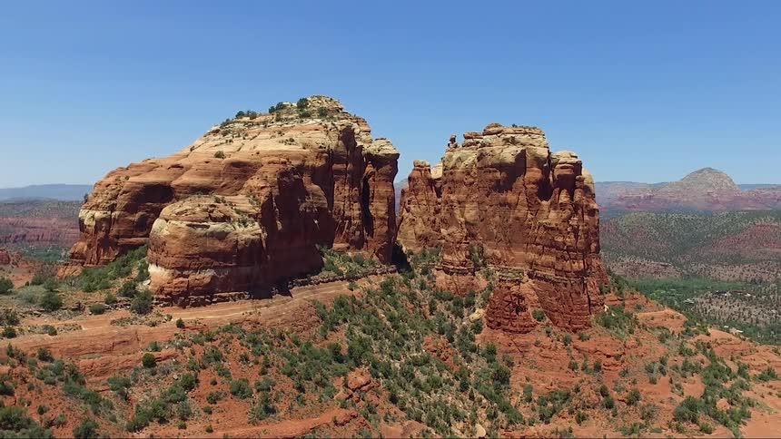 Rock formations stand tall in the desert