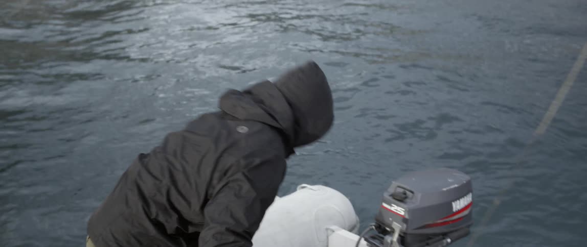 A man sits down on a raft
