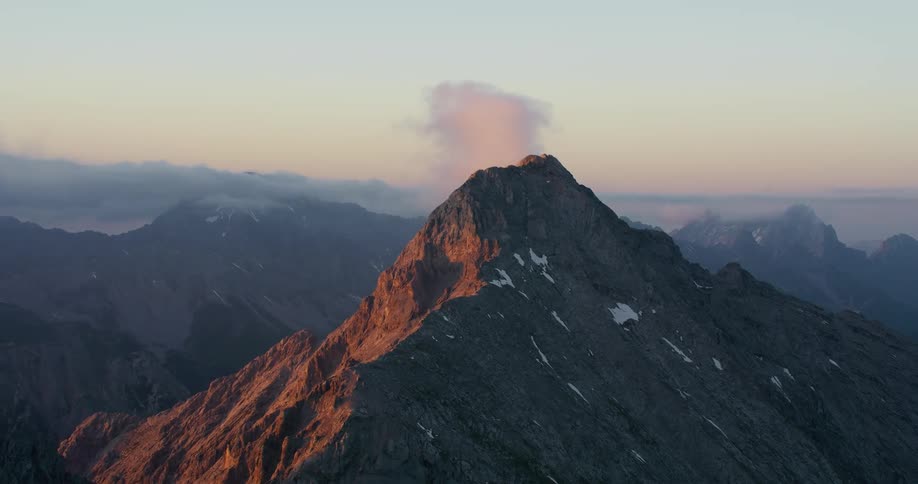 Aerial of the rocky mountains on a misty morning