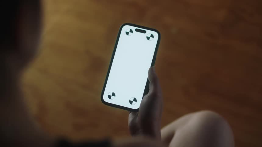 Person holding the cell phone with just one hand