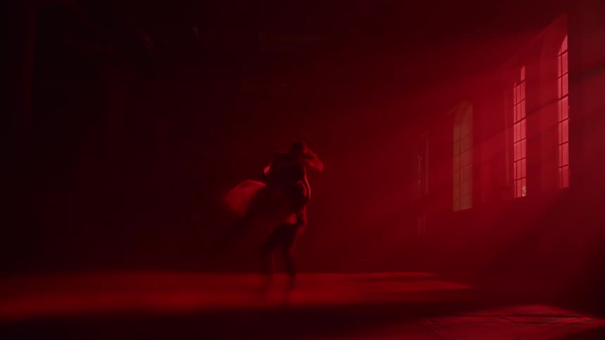 A boy and girl are ballet dancing in a studio at sunset