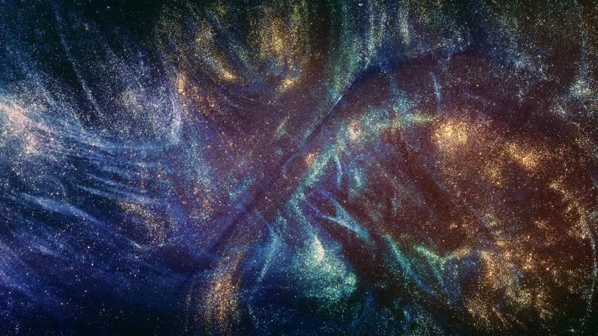 Abstract colorful sparkles against a blue background