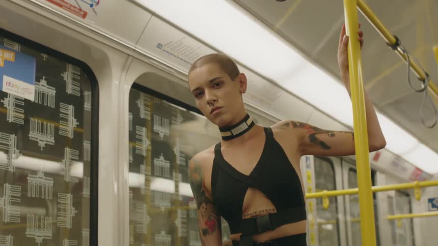 A woman is riding on the train