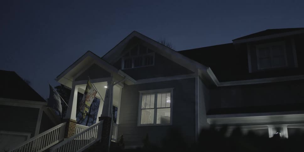 Residential house with flags at the entrance