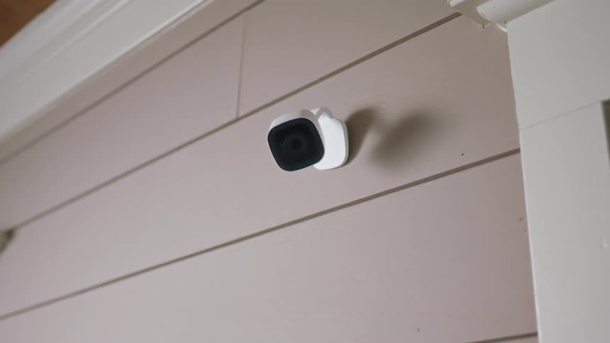 Camera on the exterior wall of a house