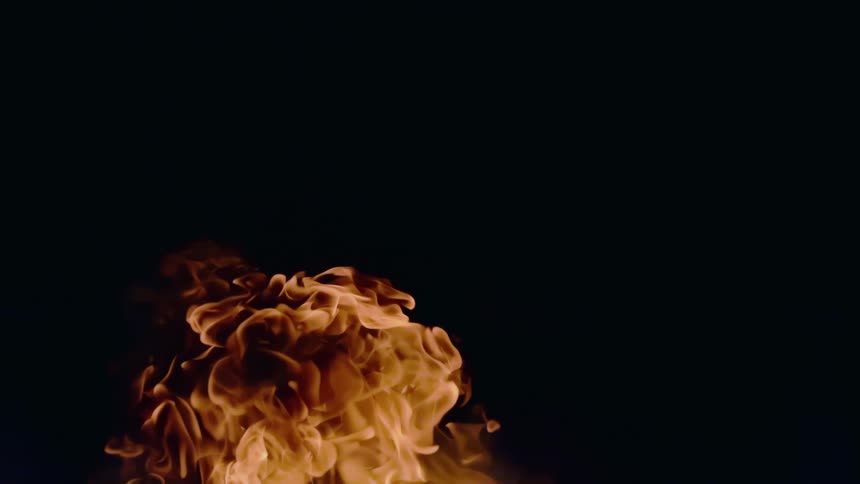 An explosion of flames in a dark environment