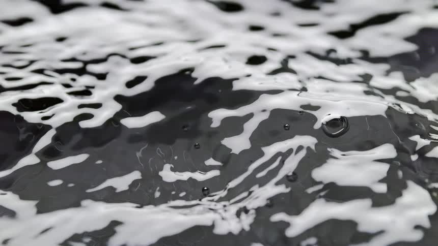 Closeup of abstract gray liquid texture