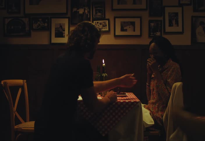 Man proposes to his girlfriend on a restaurant