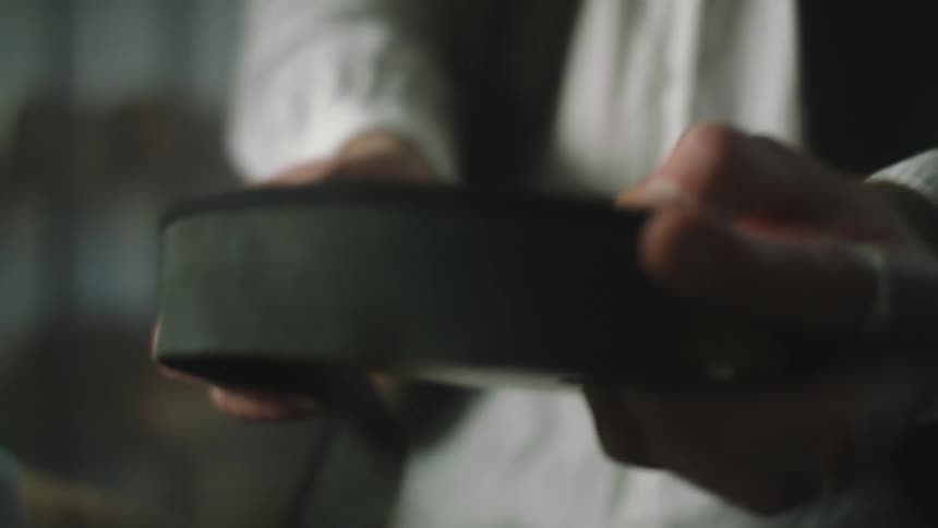 Closeup of hands performing a manufacturing task