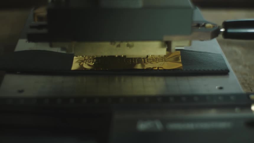 Press engraves image into metal plate