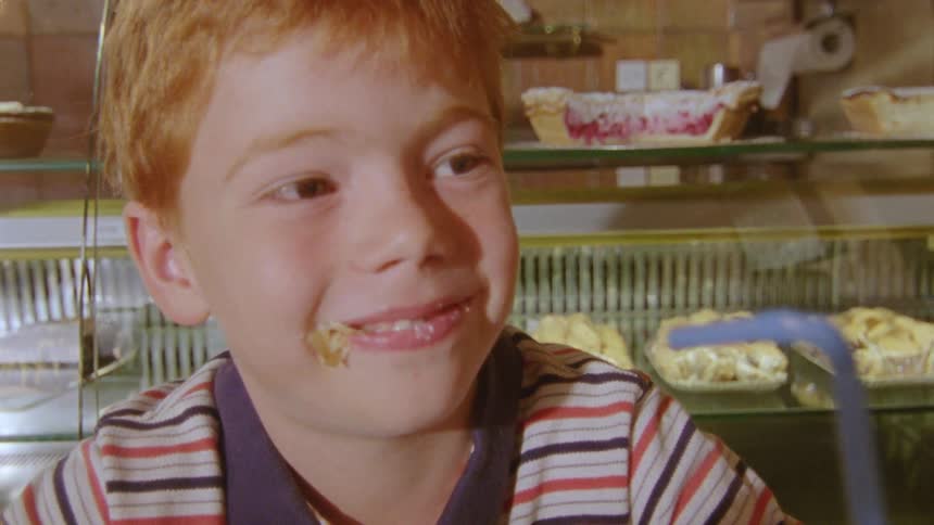 A child is eating in the restaurant