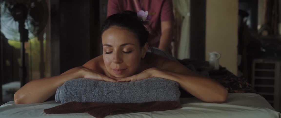 People are getting massages at an indoor spa