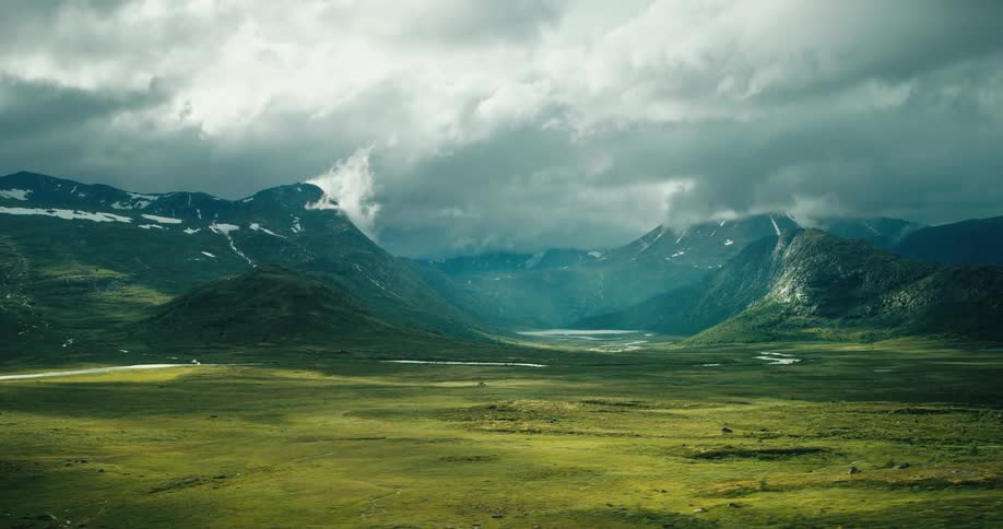 Mountains and green valley on a cloudy day