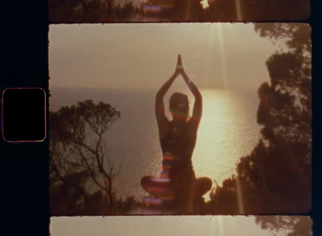 Woman doing yoga for mental well-being near the shore as part of daily routine and spiritual ritual reducing stress and achieving a clear mind with inner peace and happiness in inspiring atmosphere and moody sunlight flaring between trees