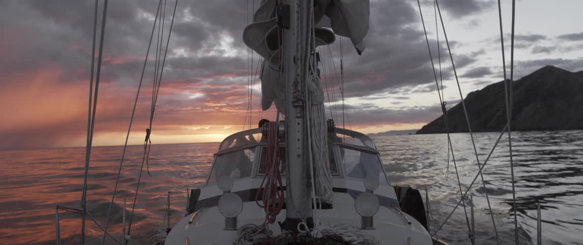 The sails on this boat are down at dawn