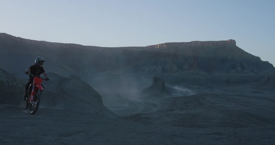 Person performing motocross in a deserted area