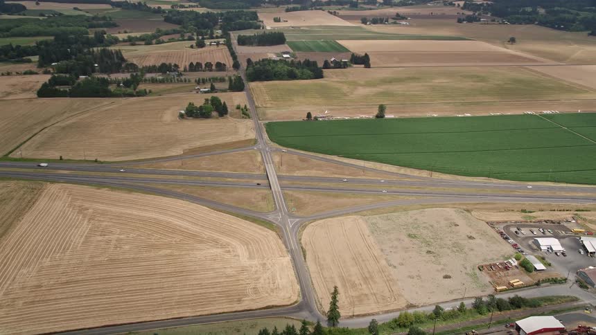 Aerial view of Highway 26 near the North Plains Gliderport in Oregon showcasing rural and agricultural areas amidst highways during summer