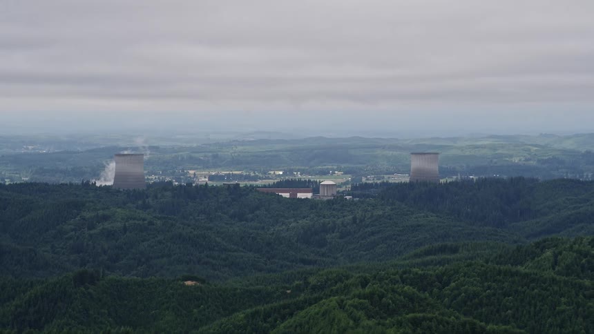 Aerial view of Satsop Nuclear Power Plant with cooling towers in Satsop Washington on a cloudy day in the summer