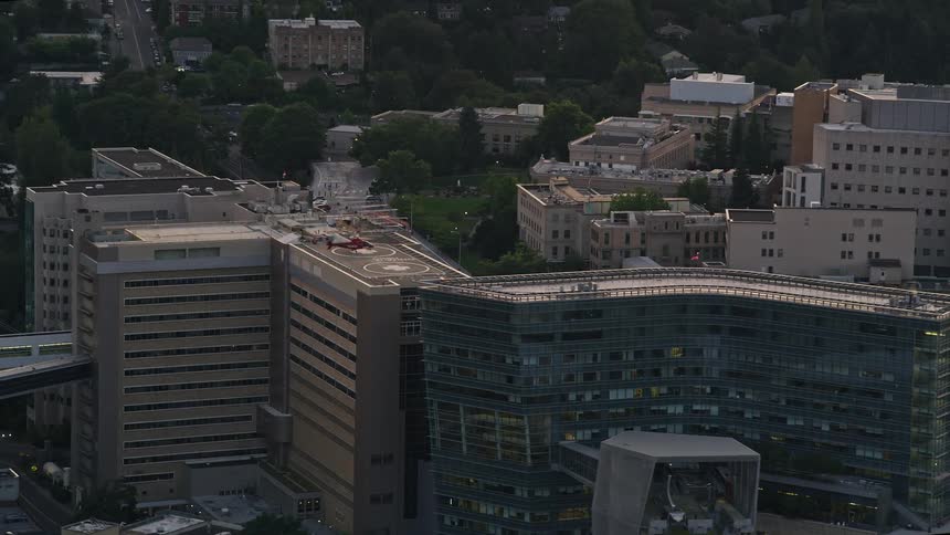 Helicopter landing at Oregon Health and Science University in Portland Oregon during sunset