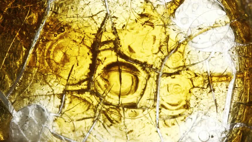 Extreme closeup of liquid moving in an abstract manner