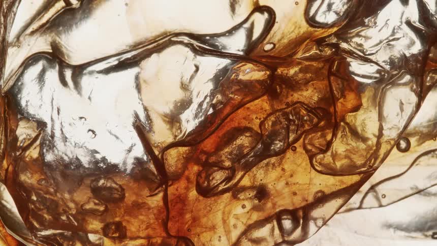 Oil fluid flow and cased bubbles around it