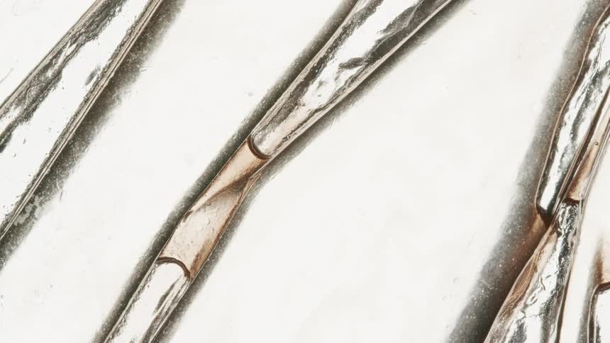 Extreme closeup of liquids moving in an abstract manner