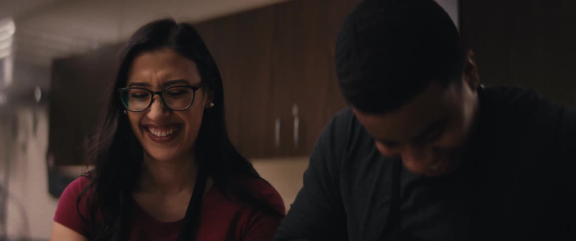 Portrait of a man and a woman laughing and cheerful towards each other