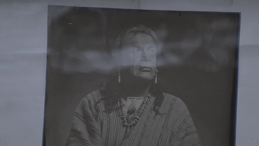 Portrait of an indigenous man placed inside water