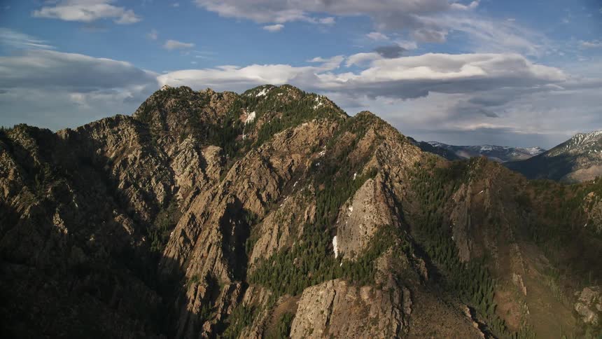  aerial footage of Mount Olympus in the Wasatch Range Utah showcasing the stunning peaks and scenic beauty during a sunny summer day