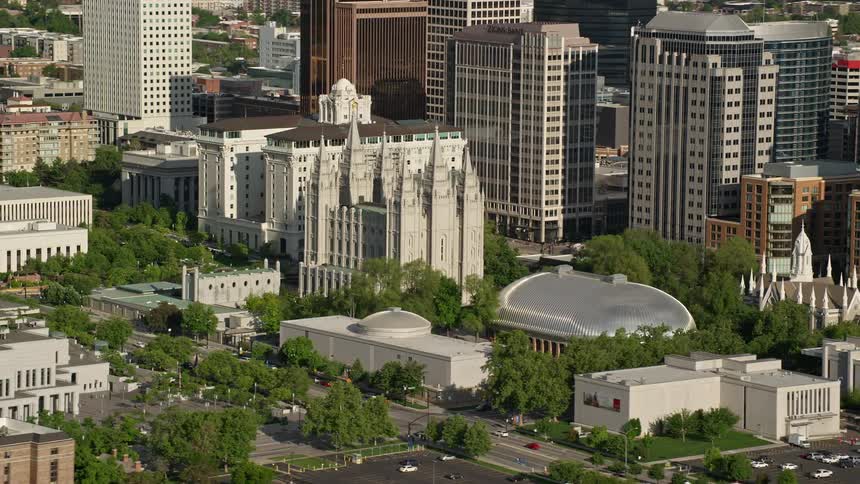 Aerial view of Salt Lake Temple Mormon Tabernacle and Downtown Salt Lake City Utah showcasing the religious and spiritual significance of the area during a sunny day in the metropolis